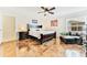 Guest bedroom with twin beds and dark wood furniture at 19811 Gulf Blvd # 102, Indian Shores, FL 33785
