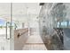Luxury bathroom with marble shower and freestanding tub at 2926 Coffee Pot Ne Blvd, St Petersburg, FL 33704