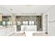 Bathroom features a large soaking tub and walk-in shower at 2926 Coffee Pot Ne Blvd, St Petersburg, FL 33704