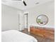 Bedroom with wood dresser and plenty of natural light at 2926 Coffee Pot Ne Blvd, St Petersburg, FL 33704