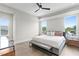 Bright bedroom with hardwood floors and a comfy bed at 2926 Coffee Pot Ne Blvd, St Petersburg, FL 33704