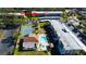 Aerial view showing condo building, pool, and tennis court at 3055 Casa Del Sol Cir # 303, Clearwater, FL 33761