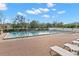 Inviting pool area with lounge chairs and a wooden deck at 3435 Bayshore Blvd # 601S, Tampa, FL 33629