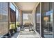 Relaxing screened porch with seating area and rug at 3829 Rippaso Pl, Brandon, FL 33511