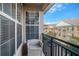 Private balcony with chair, overlooking a city view at 4221 W Spruce St # 2418, Tampa, FL 33607