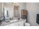 Clean bathroom with granite countertop and shower at 4221 W Spruce St # 2418, Tampa, FL 33607