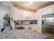 Modern kitchen with stainless steel appliances at 4221 W Spruce St # 2418, Tampa, FL 33607