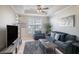 Living room with sofa, chair, and coffee table at 4221 W Spruce St # 2418, Tampa, FL 33607