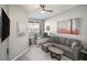Home office with desk, comfortable couch, and large window at 4221 W Spruce St # 2418, Tampa, FL 33607
