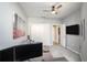 Home office with a desk, couch, and access to bathroom at 4221 W Spruce St # 2418, Tampa, FL 33607
