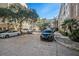 Paved community parking featuring a variety of cars parked within the community at 4221 W Spruce St # 2418, Tampa, FL 33607