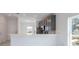 Modern kitchen with gray cabinets and island at 479 Winwood Ct, Port Charlotte, FL 33954