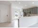 Modern kitchen with gray cabinets and island at 479 Winwood Ct, Port Charlotte, FL 33954
