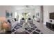 Comfortable living room with seating and large window at 479 Winwood Ct, Port Charlotte, FL 33954