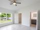 Bright bedroom with backyard views, ensuite bathroom and walk-in closet at 479 Winwood Ct, Port Charlotte, FL 33954