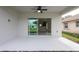 Covered patio with sliding glass doors leading to the interior at 479 Winwood Ct, Port Charlotte, FL 33954
