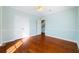 Spacious bedroom with hardwood floors and ample closet space at 55 Edgewater Dr, Dunedin, FL 34698