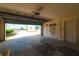 Bright garage with open door and waterfront view at 55 Edgewater Dr, Dunedin, FL 34698