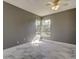 Bedroom with corner window, ceiling fan, and tile floors at 6210 68Th E Dr, Palmetto, FL 34221