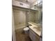 Clean bathroom with tub, toilet, sink and vanity at 6730 121St Ave # 1, Largo, FL 33773