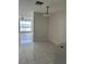 View of dining area with tile floors and access to the kitchen at 6730 121St Ave # 1, Largo, FL 33773