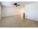 Spacious living room with tile flooring and a ceiling fan at 764 Ruskin Rd, Clearwater, FL 33765