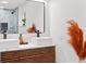 Modern bathroom with double vanity, sleek fixtures, and marble countertop at 807 E Genesee St # 1/2, Tampa, FL 33603