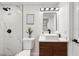 Stylish bathroom featuring marble tile, a modern vanity, and updated fixtures at 807 E Genesee St # 1/2, Tampa, FL 33603