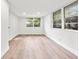 Spacious bedroom with ample natural light and wood-look flooring at 807 E Genesee St # 1/2, Tampa, FL 33603