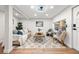 Cozy living area with a large window, comfortable seating, and wood flooring at 807 E Genesee St # 1/2, Tampa, FL 33603