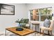 Relaxing corner in the living room with stylish seating and a large window at 807 E Genesee St # 1/2, Tampa, FL 33603
