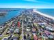 Aerial view of the home near the water at 815 Lantana Ave, Clearwater Beach, FL 33767