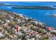 Aerial view showcasing home's waterfront proximity at 815 Lantana Ave, Clearwater Beach, FL 33767