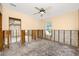 Bedroom with significant water damage, showing framing and flooring at 815 Lantana Ave, Clearwater Beach, FL 33767
