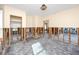 Damage to walls and flooring throughout the house shows need for renovations at 815 Lantana Ave, Clearwater Beach, FL 33767