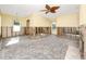 Renovation in progress, showcasing exposed walls and a ceiling fan at 815 Lantana Ave, Clearwater Beach, FL 33767