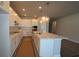 Spacious kitchen featuring white cabinets and quartz countertops at 8924 Windlass Cv, Parrish, FL 34219