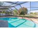 Inviting screened-in pool with a spacious deck at 10210 Rainbridge Dr, Riverview, FL 33569