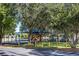 Community playground with shaded play area at 11228 Bloomington Dr, Tampa, FL 33635