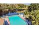 Refreshing community pool with lake view at 11616 Baywood Meadows Dr # 7, New Port Richey, FL 34654
