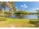 Picturesque lake view with fountain and lush greenery at 11616 Baywood Meadows Dr # 7, New Port Richey, FL 34654