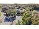 Community tennis court with surrounding trees at 11616 Baywood Meadows Dr # 7, New Port Richey, FL 34654