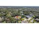 Wide aerial view of the home and neighborhood at 1242 Holiday Dr, Tarpon Springs, FL 34689