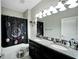 Bathroom with double sinks and granite countertop at 13210 Orca Sound Dr, Riverview, FL 33579