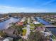 Wide aerial view showing the property and surrounding waterfront community at 1998 Massachusetts Ne Ave, St Petersburg, FL 33703