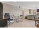 Small dining area with glass-top table and chairs at 1998 Massachusetts Ne Ave, St Petersburg, FL 33703