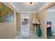 Bright and spacious entryway with view into living room at 1998 Massachusetts Ne Ave, St Petersburg, FL 33703