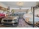 Two-car garage with ample storage shelving and flooring at 1998 Massachusetts Ne Ave, St Petersburg, FL 33703