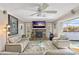 Spacious living room with fireplace and view of canal and pool at 1998 Massachusetts Ne Ave, St Petersburg, FL 33703