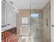 Large shower with tiled walls and glass enclosure at 1998 Massachusetts Ne Ave, St Petersburg, FL 33703